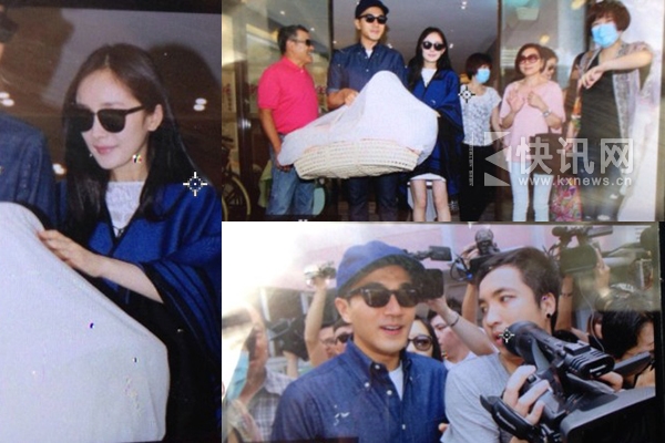 杨幂出院 老公刘恺威提婴儿篮一旁护驾(图) 杨幂出院赶回家喂奶 与刘恺威着蓝色情侣装表情喜悦